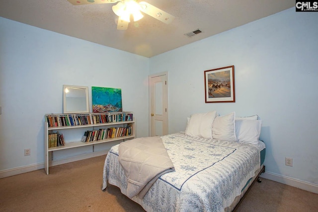 bedroom featuring carpet and ceiling fan