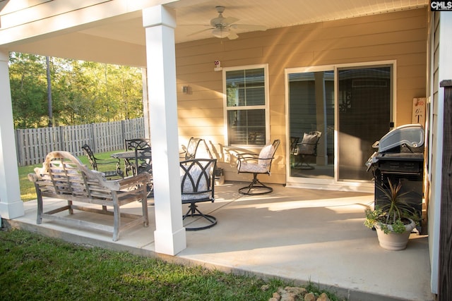 view of patio / terrace featuring ceiling fan