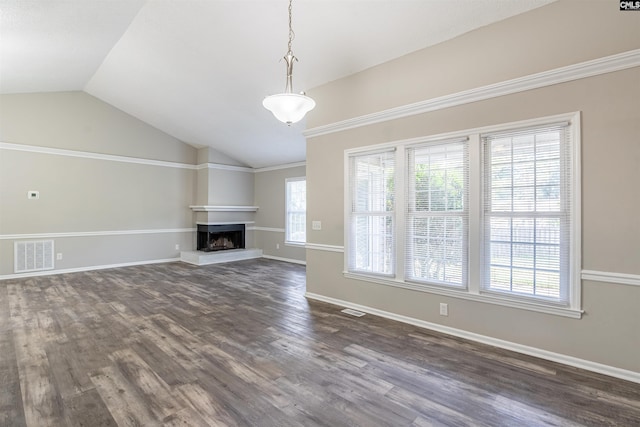 unfurnished living room featuring lofted ceiling and dark hardwood / wood-style flooring