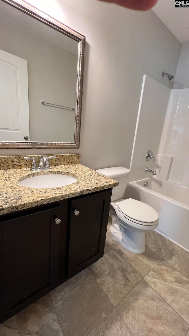 full bathroom featuring toilet, shower / bathtub combination, and vanity