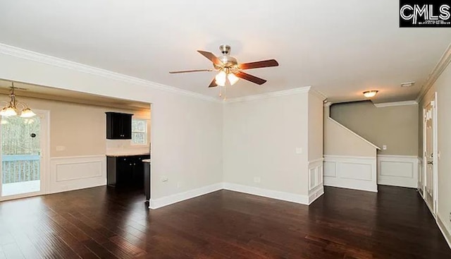 unfurnished living room featuring dark wood-type flooring, ceiling fan with notable chandelier, and crown molding