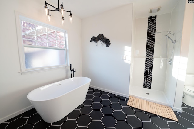 bathroom featuring independent shower and bath, toilet, and tile patterned flooring