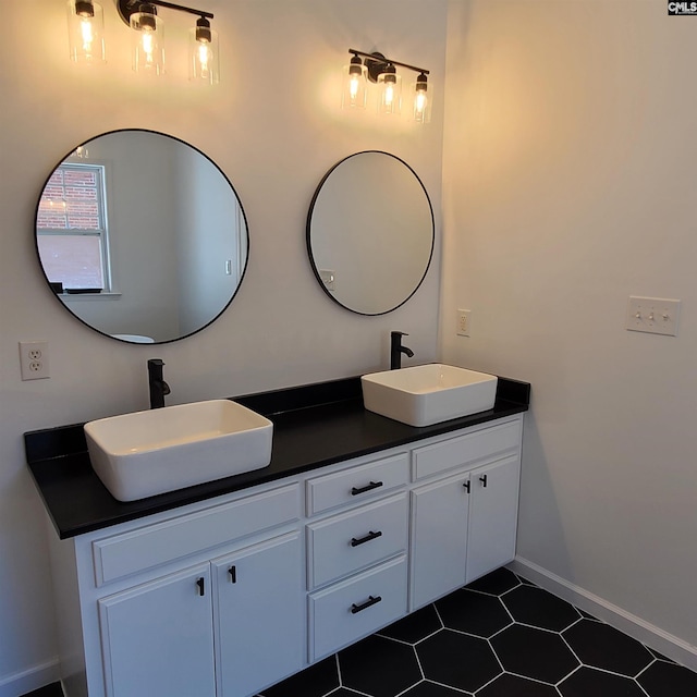 bathroom with vanity and tile patterned floors