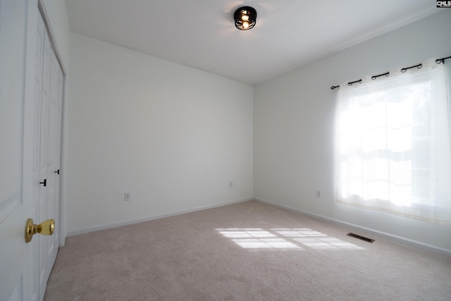 empty room with light carpet