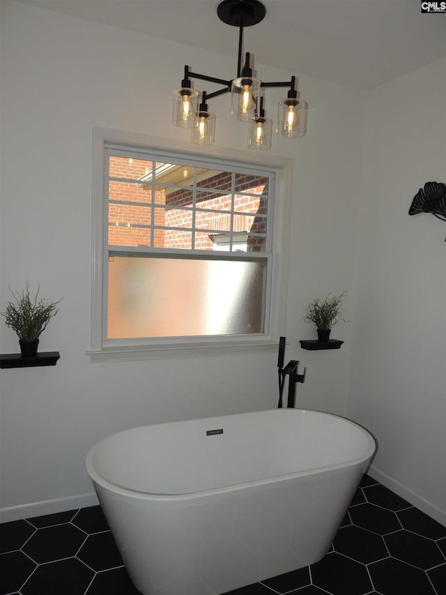 bathroom featuring tile patterned floors and a bathtub