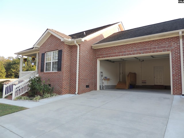 exterior space with a garage