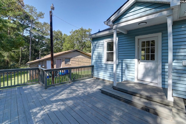 deck with a storage shed