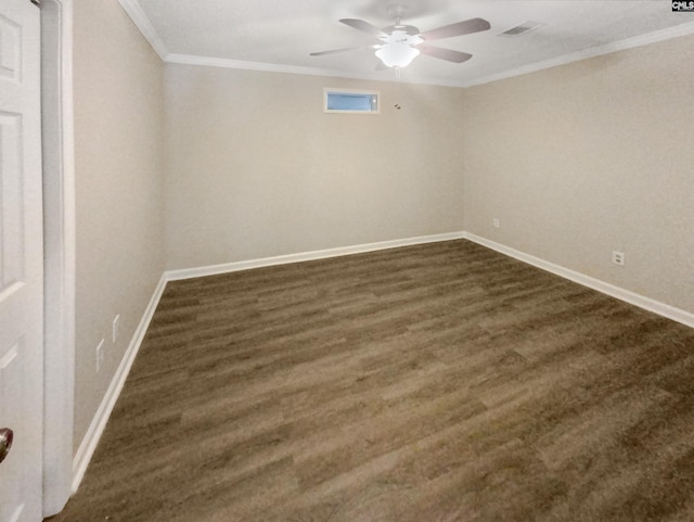 unfurnished room with dark wood-type flooring, crown molding, and ceiling fan