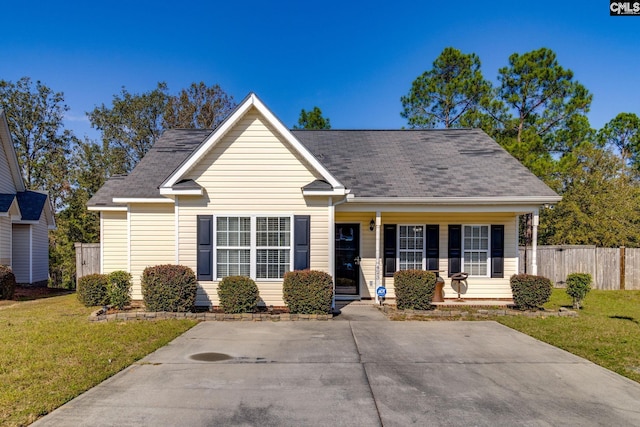 view of front of home with a front lawn and covered porch