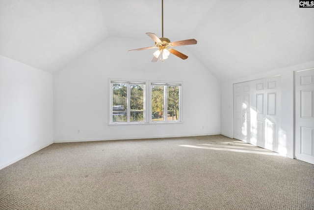 bonus room with lofted ceiling, carpet flooring, and ceiling fan