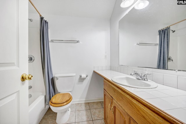 full bathroom with tasteful backsplash, shower / tub combo, toilet, vanity, and tile patterned flooring