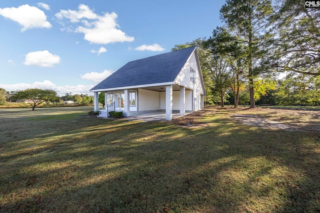 exterior space with a front lawn and covered porch