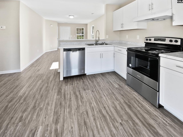 kitchen with white cabinetry, appliances with stainless steel finishes, and sink