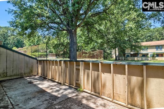 view of patio / terrace featuring a swimming pool