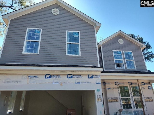 view of home's exterior with a garage