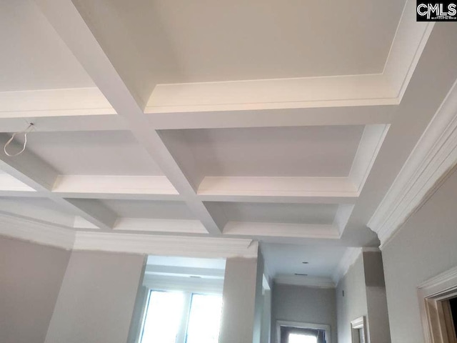 interior details featuring beamed ceiling and coffered ceiling