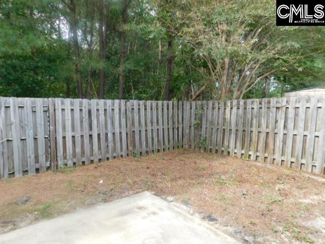 202 Elders Pond Cir, Columbia, SC 29229 - view of yard featuring a fenced backyard and a patio area