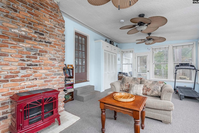 living room with carpet and a textured ceiling