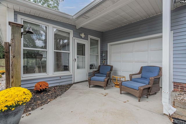 view of patio with a garage