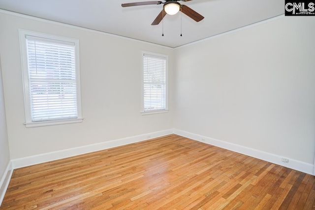 spare room with ornamental molding, light hardwood / wood-style floors, and ceiling fan