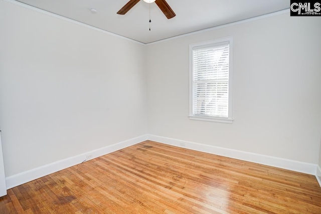 spare room with ornamental molding, hardwood / wood-style floors, and ceiling fan