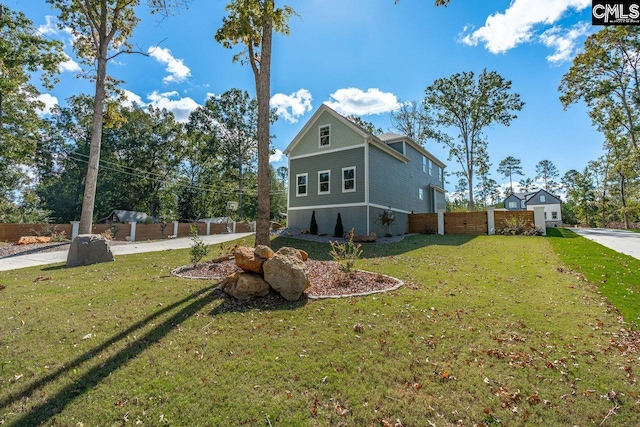 exterior space with a yard