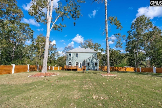 view of yard featuring a deck