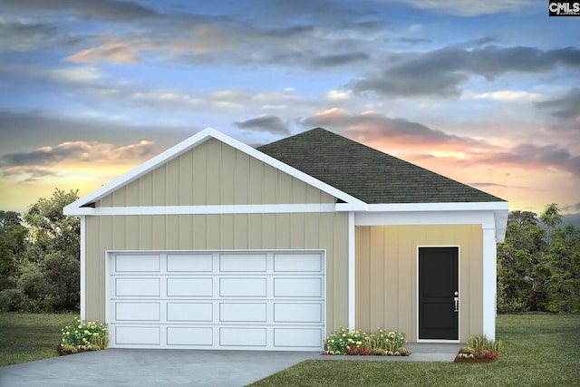 garage at dusk with a yard and wooden walls