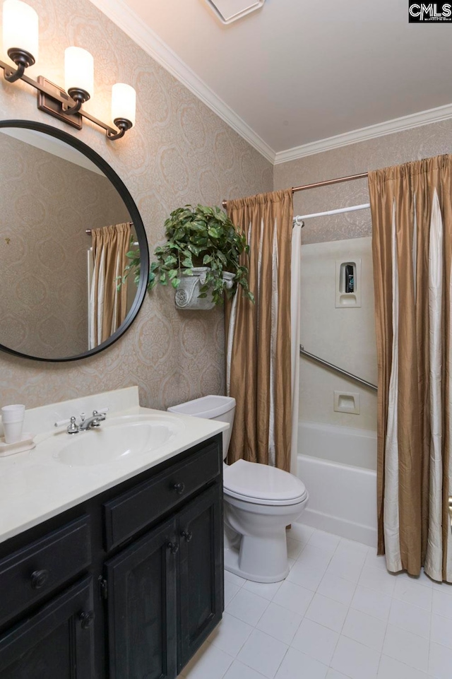 full bathroom with tile patterned floors, toilet, crown molding, vanity, and shower / bath combo with shower curtain