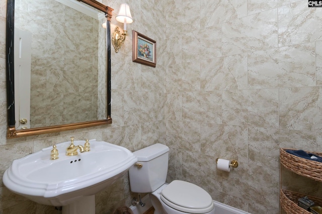 bathroom with sink and toilet