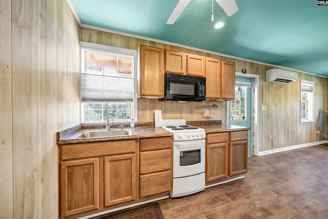 kitchen with sink, wooden walls, a wall mounted AC, and white stove