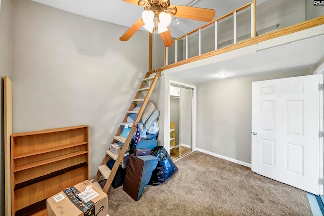 interior space featuring ceiling fan