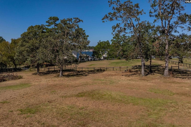 view of yard with a rural view