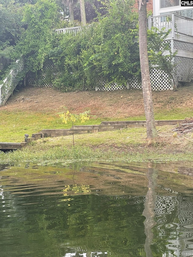 view of yard with a water view