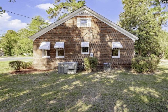 6560 Voorhees Rd, Denmark, SC 29042 - view of side of property featuring brick siding and a lawn