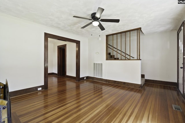 6560 Voorhees Rd, Denmark, SC 29042 - unfurnished living room with wood finished floors, stairs, ceiling fan, and crown molding