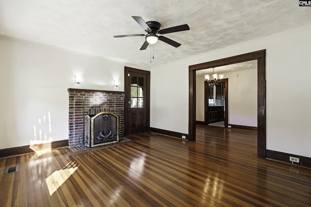 6560 Voorhees Rd, Denmark, SC 29042 - unfurnished living room featuring hardwood / wood-style flooring, a chandelier, a brick fireplace, a ceiling fan, and crown molding