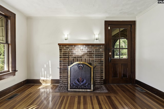 6560 Voorhees Rd, Denmark, SC 29042 - unfurnished living room featuring wood finished floors, a fireplace, and crown molding