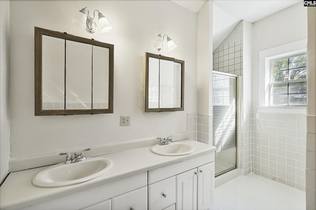 6560 Voorhees Rd, Denmark, SC 29042 - bathroom featuring double vanity and a shower with door