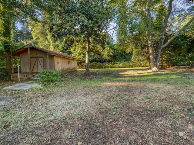 6731 Formosa Dr, Columbia, SC 29206 - view of yard with an outbuilding and a storage unit