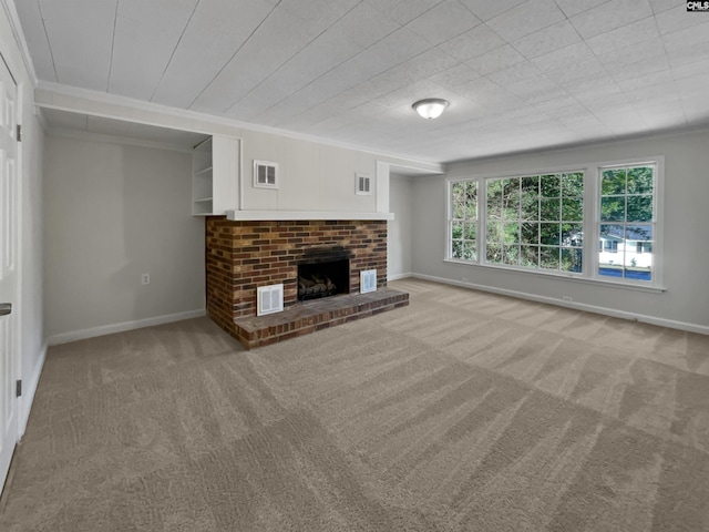 unfurnished living room with light carpet, ornamental molding, and a brick fireplace