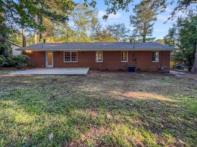 6731 Formosa Dr, Columbia, SC 29206 - rear view of property with central AC, a yard, a patio, and a shingled roof