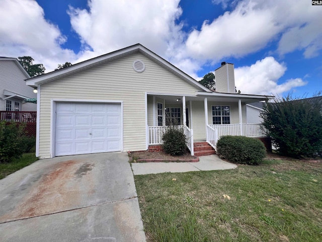 view of front of property with a garage, a porch, and a front yard