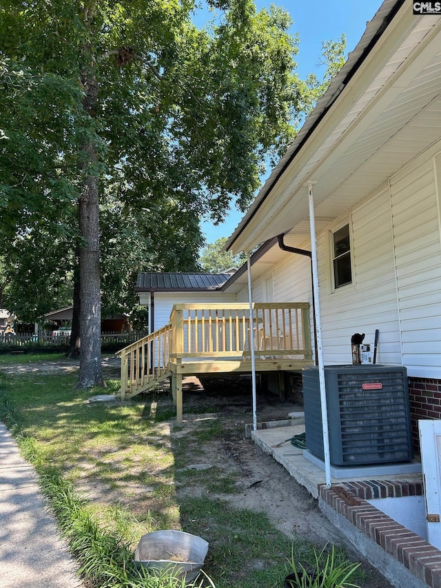 exterior space featuring central air condition unit