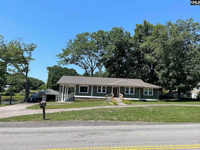 view of front of home with a front lawn and a porch