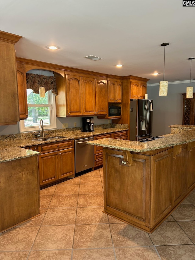 kitchen featuring ornamental molding, sink, light tile patterned flooring, pendant lighting, and appliances with stainless steel finishes