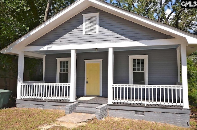 bungalow-style home with a porch