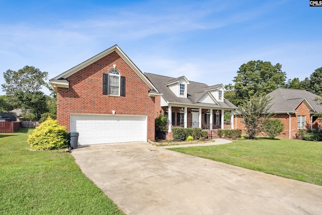 view of front of home featuring a front yard and a garage