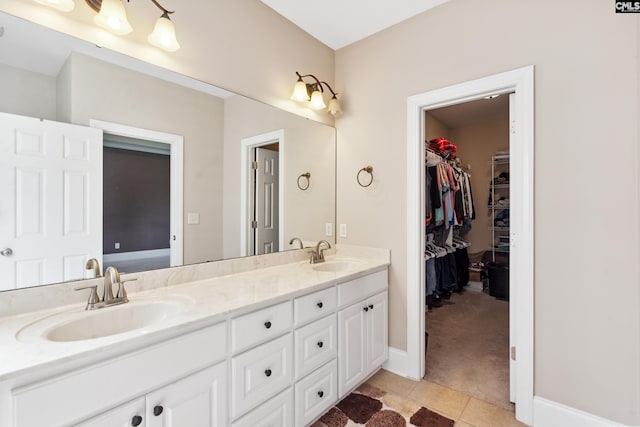 bathroom featuring vanity and tile patterned flooring