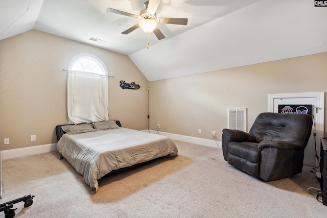 carpeted bedroom featuring vaulted ceiling and ceiling fan